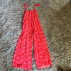 This is a super cute kids jumper that is red pink and white!